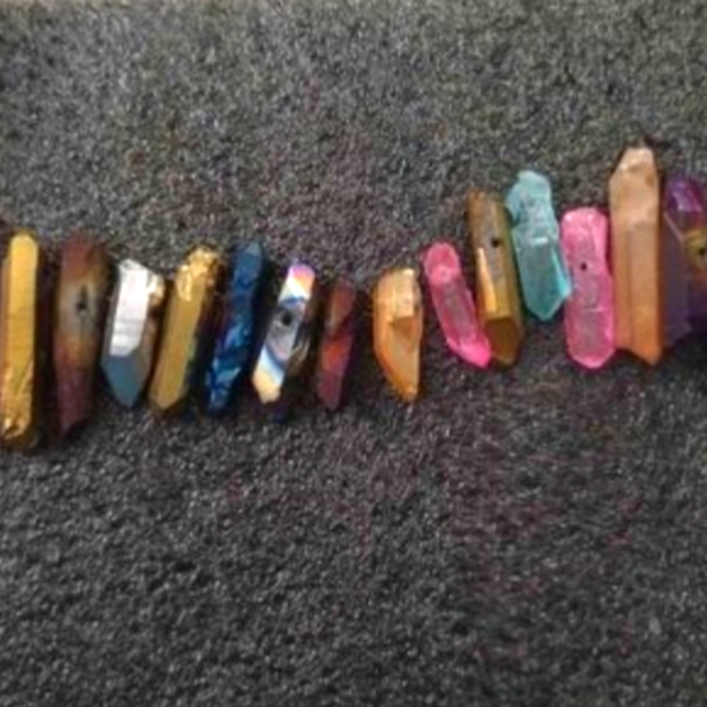 12-15 diff crystals/stones, over $80 value! W/ pre-made holes to make jewelry